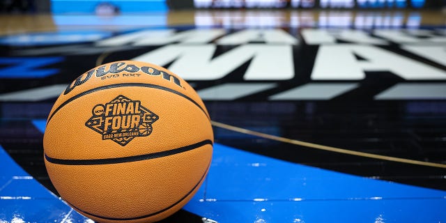 A general view of a basketball with the Final Four logo on the court before the Elite Eight round of the 2022 NCAA Men's Basketball Tournament game between the North Carolina Tar Heels and the St. Peter's Peacocks held at Wells Fargo Center on March 27, 2022 in Philadelphia, Pennsylvania.