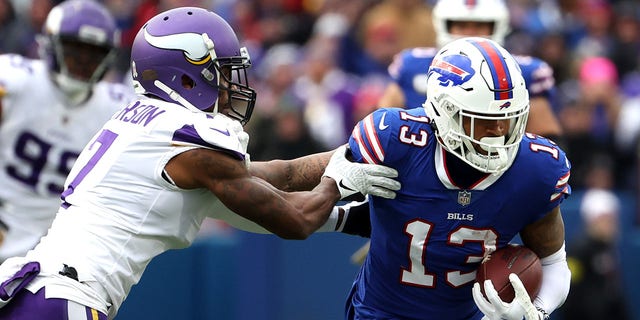 Patrick Peterson, #7 of the Minnesota Vikings, tackles Gabe Davis, #13 of the Buffalo Bills, during the fourth quarter at Highmark Stadium on Nov. 13, 2022 in Orchard Park, New York.