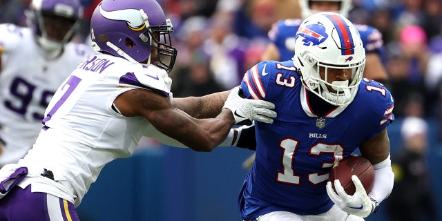 Patrick Peterson, #7 of the Minnesota Vikings, tackles Gabe Davis, #13 of the Buffalo Bills, during the fourth quarter at Highmark Stadium on Nov. 13, 2022 in Orchard Park, New York.