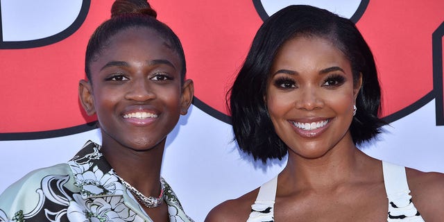 Gabrielle Union, the wife of Dwyane Wade, and Zaya Wade, left, arrive for the "Cheaper by the Dozen" Disney premiere at the El Capitan Theatre in Hollywood, Calif., March 16, 2022.