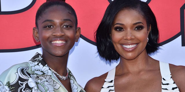 Gabrielle Union, the wife of Dwyane Wade, and Zaya Wade, left, arrive for the "cheaper by the dozen" Disney premiere at the El Capitan Theater in Hollywood, California on March 16, 2022.