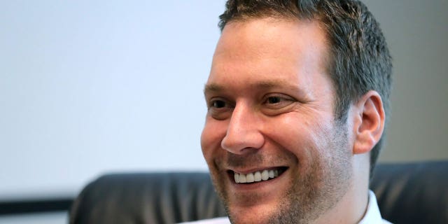 In this Sep. 30, 2019 photo, Seminole County Tax Collector Joel Greenberg talks to the Orlando Sentinel during an interview at his office in Lake Mary, Florida. nberg pleaded guilty to six federal crimes, including sex trafficking of a minor, identity theft, stalking, wire fraud and conspiracy to bribe a public official.