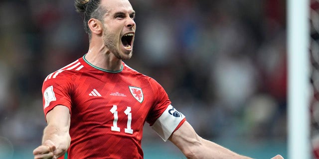 Wales' Gareth Bale celebrates after scoring against the United States at the Ahmad Bin Ali Stadium in Doha, Qatar, Monday, Nov. 21, 2022.