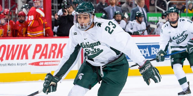 Jagger Joshua, #23 of the Michigan State Spartans, follows the play against the Ferris State Bulldogs in the first period of the consolation game during the Great Lakes Invitational Hockey Tournament on day two at Little Caesars Arena on Dec. 31, 2019 in Detroit. Michigan State defeated Ferris State 5-2. 