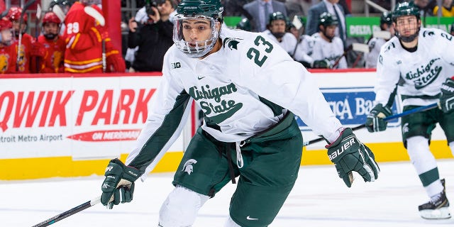 Jagger Joshua, #23 of the Michigan State Spartans, follows the play against the Ferris State Bulldogs in the first period of the consolation game during the Great Lakes Invitational Hockey Tournament on day two at Little Caesars Arena on December 31, 2019 in Detroit. Michigan State defeated Ferris State 5-2.