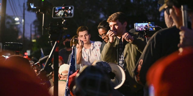 Nick Fuentes speaks during a "Stop the Steal" rally outside the Governor's Mansion in Georgia on November 19th, 2020. 