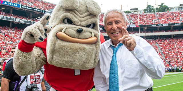 Georgia Bulldogs mascot Hairy Dawg with Lee Corso before an NCAA football game between the Arkansas Razorbacks and Georgia Bulldogs Oct. 2, 2021, at Sanford Stadium in Athens, Ga.