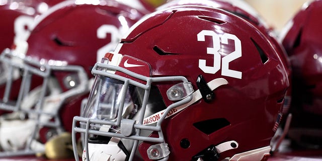 Alabama Crimson Tide helmets sit on the sidelines during their championship game against the Georgia Bulldogs on January 10, 2022 at Lucas Oil Stadium in Indianapolis, Indiana.