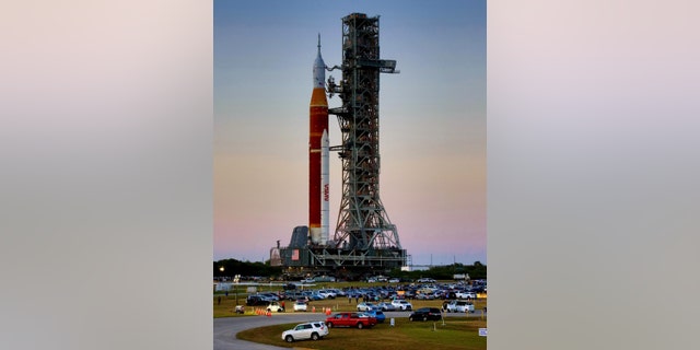 At Kennedy Space Center, Fla., NASA's moon rocket for the Artemis 1 mission rolls to the launch pad on Thursday, March 17, 2022. 