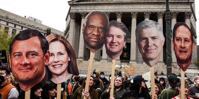 Demonstrators with signs of U.S. Supreme Court Justices during a pro-abortion protest in New York City on Tuesday, May 3, 2022. 