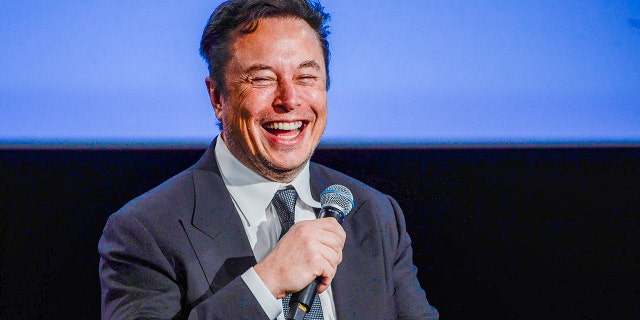 Tesla CEO Elon Musk smiles as he addresses guests at the Offshore Northern Seas 2022 (ONS) meeting in Stavanger, Norway on Aug. 29, 2022. 