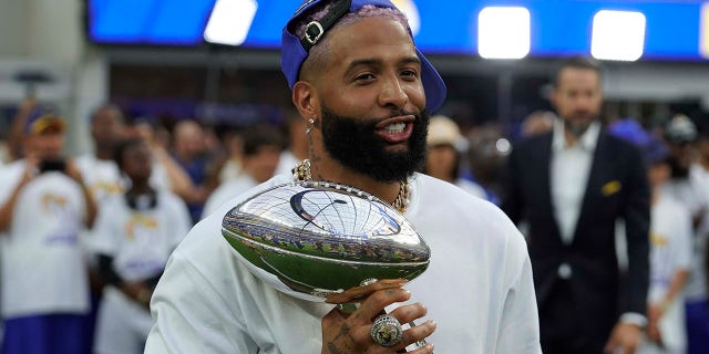 Los Angeles Rams' Odell Beckham Jr. with the Vince Lombarbi Trophy during the Buffalo Bills game on Sept. 8, 2022, at SoFi Stadium in Inglewood, California.