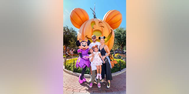 Hudson, Fujikawa, Bingham and Rani Rose are pictured here in September on a family trip to Disneyland in Anaheim, California.