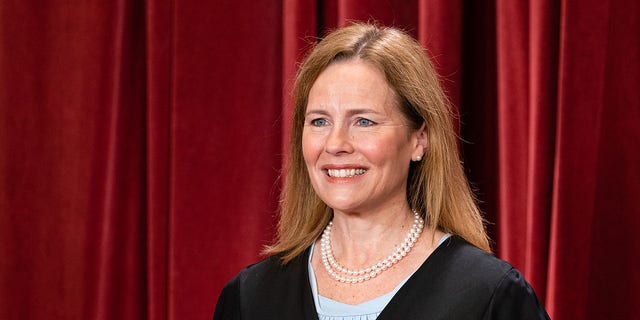 Associate Justice Amy Coney Barrett during the formal group photograph at the Supreme Court in Washington, DC, US, on Friday, Oct. 7, 2022. 