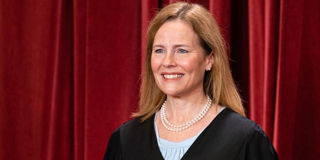 Associate Justice Amy Coney Barrett during the formal group photograph at the Supreme Court in Washington, DC, US, on Friday, Oct. 7, 2022. 