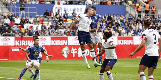 (lr) Yuta Nakayama of Japan, Aaron Long of United States men's national team, Wataru Endo of Japan, Weston McKennie of United States men's national team during the Japan vs. United States International Friendly at Dusseldorf Arena on September 23, 2022 in Dusseldorf, Germany.