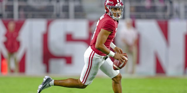 Bryce Young of the Alabama Crimson Tide runs the ball during the first half against the Mississippi State Bulldogs at Bryant-Denny Stadium Oct. 22, 2022, in Tuscaloosa, Ala.