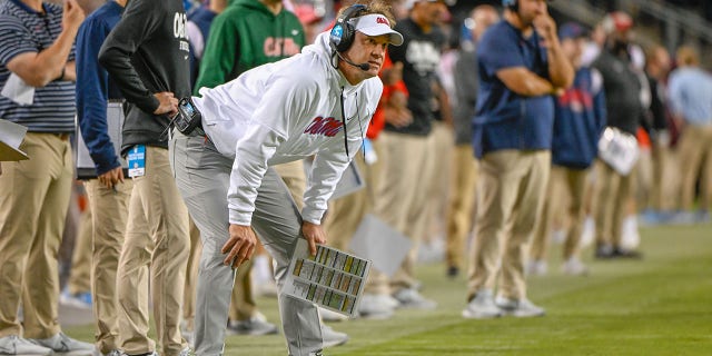 Mississippi Rebels head coach Lane Kiffin watches from the sidelines during the football game between the Ole Miss Rebels and Texas A&M Aggies at Kyle Field on October 29, 2022 in College Station, Texas. 