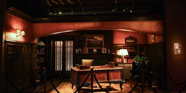 The exhibit includes the original desk and chair that were featured throughout the trilogy.