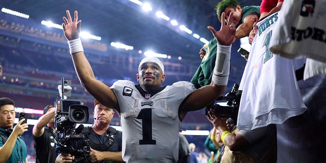 Jalen Hurts, #1 of the Philadelphia Eagles, celebrates as he runs off the field after defeating the Houston Texans at NRG Stadium on Nov. 3, 2022 in Houston.