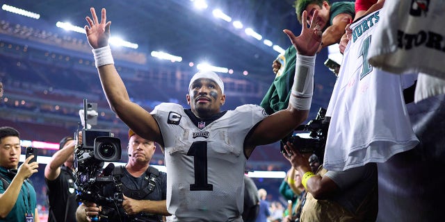 Jalen Hurts, #1 of the Philadelphia Eagles, celebrates as he runs off the field after defeating the Houston Texans at NRG Stadium on Nov. 3, 2022 in Houston.