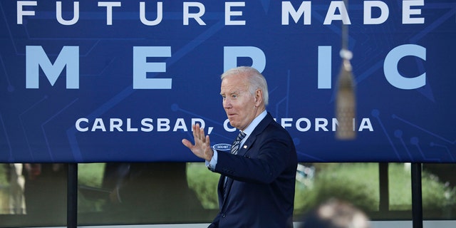 US President Joe Biden speaks with dignitaries and employees at ViaSat on November 4, 2022 in Carlsbad, California. 