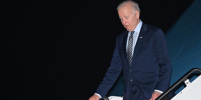 US President Joe Biden disembarks from Air Force One upon arrival at Chicago O'Hare International Airport in Chicago, Illinois, November 4, 2022, as he travels during a 4-day campaign swing ahead of the midterm elections. 