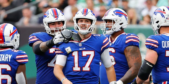 Buffalo Bills quarterback Josh Allen, #17, gets his shoulder pad fixed during the National Football League game between the New York Jets and Buffalo Bills on Nov. 6, 2022 at MetLife Stadium in East Rutherford, New Jersey.  