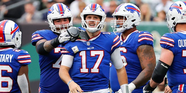 Buffalo Bills quarterback Josh Allen, #17, gets his shoulder pad fixed during the National Football League game between the New York Jets and Buffalo Bills on Nov. 6, 2022 at MetLife Stadium in East Rutherford, New Jersey.  