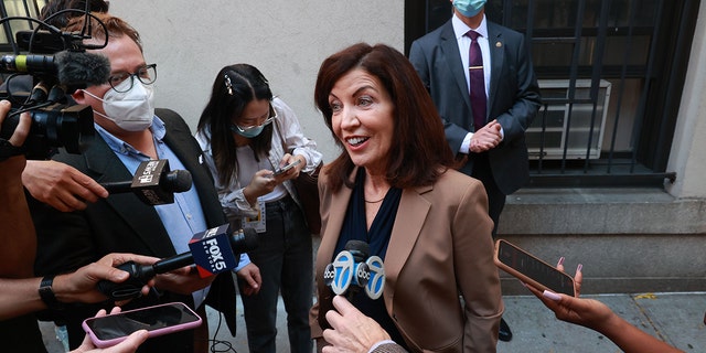 New York Gov. Kathy Hochul talks to reporters after visiting the Hamilton Housing Development on West 73rd Street and Broadway in the Upper West side of Manhattan, New York. 