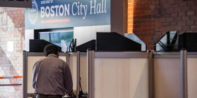 A person fills out their ballot in Boston City Hall in the US midterm election, in Boston on Nov. 8, 2022.