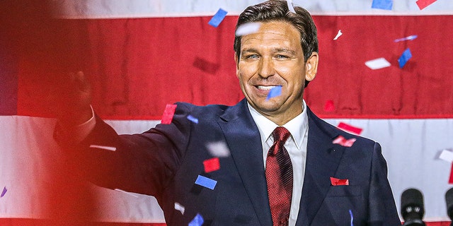 DeSantis waves to the crowd during an election night watch party at the Convention Center in Tampa on November 8, 2022.