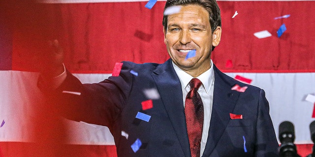 DeSantis waves to the crowd during an election night watch party at the Convention Center in Tampa on November 8, 2022.