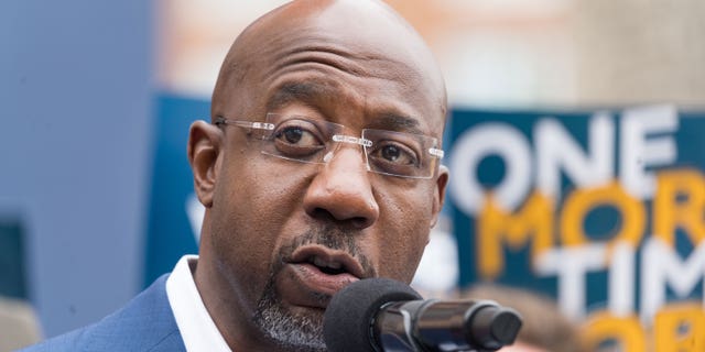 Sen. Raphael Warnock, D-Ga., speaks at a press conference to discuss his runoff campaign on Nov. 10, 2022 in Atlanta.