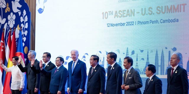 (L-R) Philippines' President Ferdinand Marcos Jr., Singapore's President Lee Hsien Loong, Thailand's Prime Minister Prayut Chan-o-cha, Vietnams Prime Minister Pham Minh Chinh, U.S. President Joe Biden, Cambodia's Prime Minister Hun Sen, Indonesia's President Joko Widodo, Sultan of Brunei Hassanal Bolkiah, Laos' Prime Minister Phankham Viphavanh and Malaysia's lower house speaker Azhar Azizan Harun stand on stage during the ASEAN-U.S. Summit as part of the 40th and 41st Association of Southeast Asian Nations (ASEAN) Summits in Phnom Penh on Nov. 12, 2022.