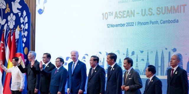 (LR) Philippines' President Ferdinand Marcos Jr, Singapore's President Lee Hsien Loong, Thailand's Prime Minister Prayut Chan-o-cha, Vietnams Prime Minister Pham Minh Chinh, US President Joe Biden, Cambodia's Prime Minister Hun Sen, Indonesia's President Joko Widodo, Sultan of Brunei Hassanal Bolkiah, Laos' Prime Minister Phankham Viphavanh and Malaysia's lower house speaker Azhar Azizan Harun stand on stage during the ASEAN-US Summit as part of the 40th and 41st Association of Southeast Asian Nations (ASEAN) Summits in Phnom Penh on Nov. 12, 2022.