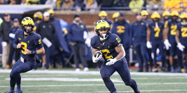 Michigan Wolverines running back Blake Corum (2) runs with the ball during a game against the Nebraska Cornhuskers Nov. 12, 2022, at Michigan Stadium in Ann Arbor, Mich.  