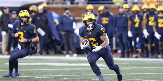 Michigan Wolverines running back Blake Corum (2) runs with the ball during a game against the Nebraska Cornhuskers Nov. 12, 2022, at Michigan Stadium in Ann Arbor, Mich.