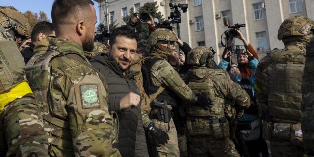 Ukrainian President Volodymyr Zelenskyy makes a surprise visit to Kherson Nov. 14, 2022. 