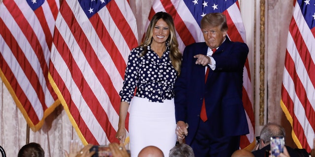 Former President Donald Trump arrives to speak with former First Lady Melania Trump, left, at his Mar-a-Lago Club in Palm Beach, Florida, on Tuesday, Nov. 15, 2022.