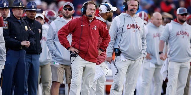 Alabama Crimson Tide head coach Nick Saban and offensive line coach Eric Wolford on the sidelines during a Mississippi Rebels game on November 12, 2022, at Vaught-Hemingway Stadium in Oxford.