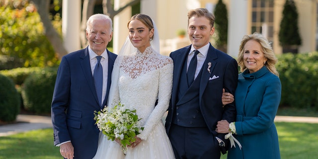 WASHINGTON, DC - NOVEMBER 19: In this handout provided by The White House,  President Joe Biden and First Lady Jill Biden attend the wedding of Peter Neal and Naomi Biden Neal on the South Lawn of the White House on November 19, 2022  in Washington DC. 