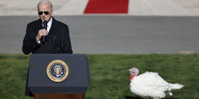 President Biden speaks after roasting the national Thanksgiving turkey during a ceremony on the South Lawn of the White House, Nov. 21, 2022.