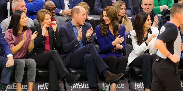 Prince William and Princess Kate sit courtside at a Celtics game in their first visit to the United States since the queen died.