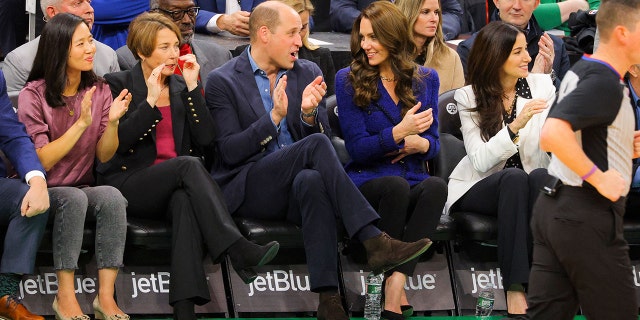 Prince William and Princess Kate attended a Celtics game during their first visit to the United States since the queen died.