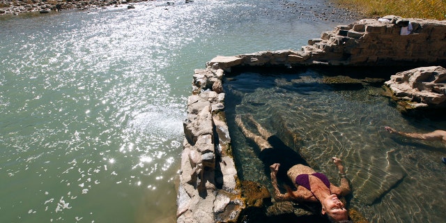 Cynta de Narvaez soaks in the Big Bend National Park hot springs on a Far Flung Adventures canoe trip down the Rio Grande River in Big Bend National Park near Terlingua, Texas, on Jan. 14, 2012.