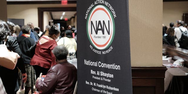 People attend the National Action Network's three-day annual national convention on April 7, 2022, in New York City. 