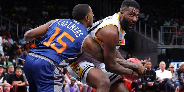 Donte Green #20 of Killer 3 controls the ball against Mario Chalmers #15 of 3's Company during the All-Star game prior to the BIG3 Championship at State Farm Arena on August 21, 2022 in Atlanta, Georgia.