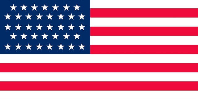 Historical flag of the United States of America. The 46-Star American flag became official on July 4, 1908, reflecting Oklahoma's admission to the Union in 1907. It was flown until 1912.
