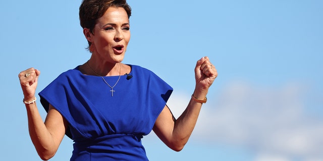 Arizona Republican nominee for governor Kari Lake speaks during a campaign rally attended by former US President Donald Trump